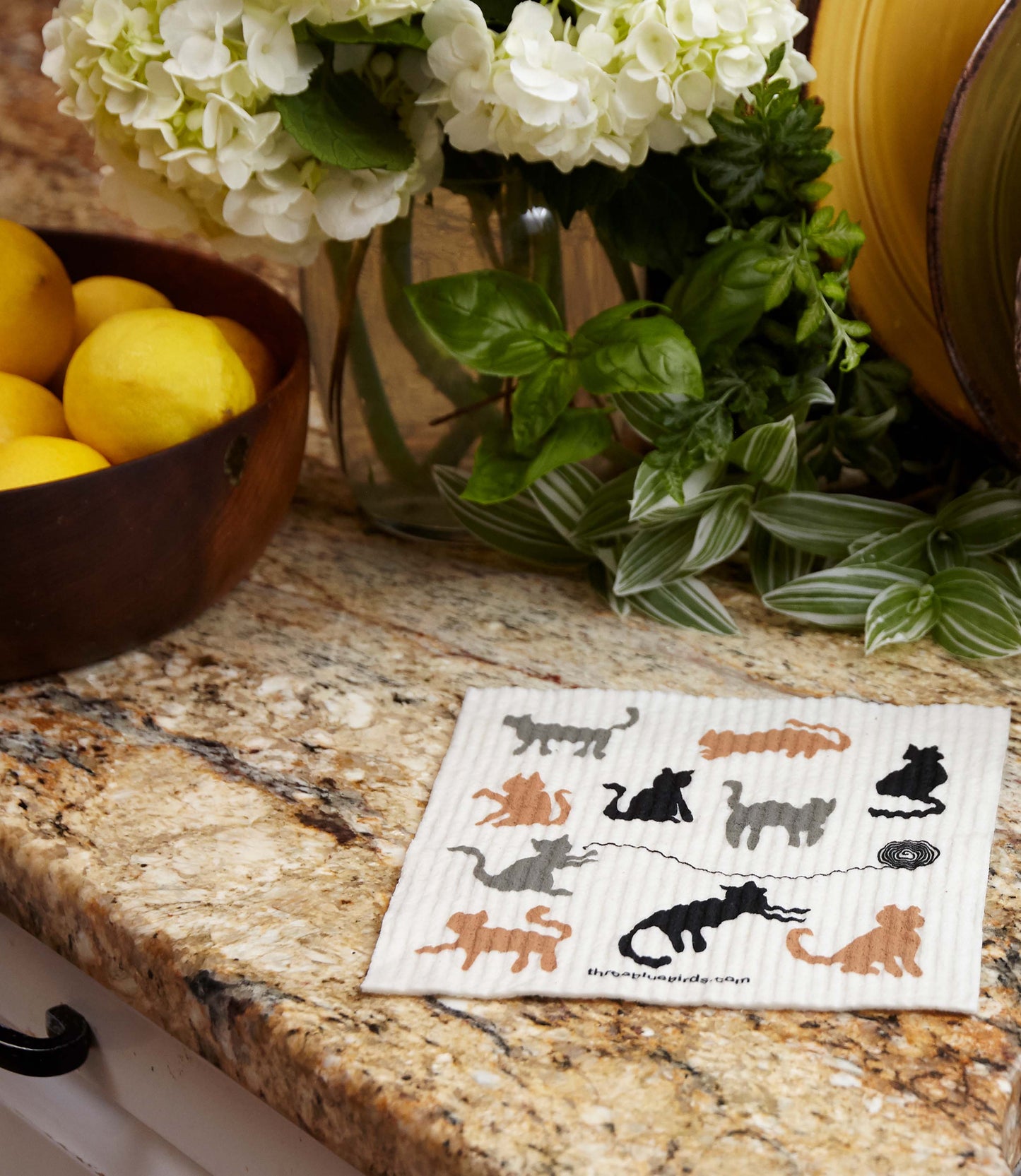Cats Swedish Dishcloth on a countertop.